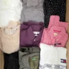 The photo shows a package with clothing in the category U.