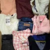 The photo shows a package with clothing in the category U.