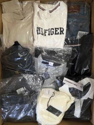 The photo shows a package with clothing in the category C.