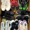 The photo shows a package with footwear in the category SH.