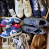 The photo shows a package with footwear in the category SH.