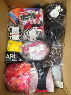 The photo shows a package with clothing in the category ABW.