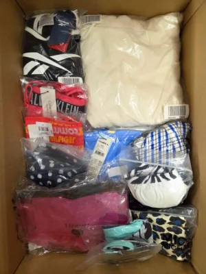 The photo shows a package with clothing in the category ABW.