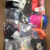 The photo shows a package with clothing in the category ABW.
