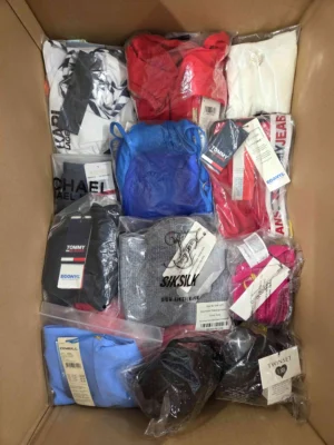 The photo shows a package with clothing in the category ABW.