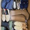 The photo shows a package with clothing in the category BPS.