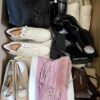 The photo shows a package with clothing in the category BPS.