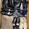 The photo shows a package with clothing in the category BPS.
