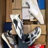 The photo shows a package with footwear in the category BS.