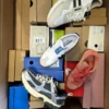 The photo shows a package with footwear in the category BS.