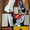 The photo shows a package with footwear in the category BS.