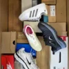 The photo shows a package with footwear in the category BS.