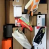 The photo shows a package with footwear in the category BS.