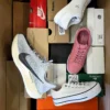 The photo shows a package with footwear in the category BS.