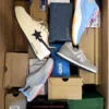 The photo shows a package with footwear in the category BS.
