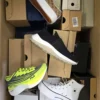 The photo shows a package with footwear in the category BS.