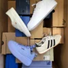 The photo shows a package with footwear in the category BS.
