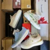 The photo shows a package with footwear in the category BS.