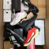 The photo shows a package with footwear in the category BS.