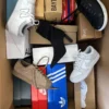 The photo shows a package with footwear in the category BS.