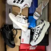 The photo shows a package with footwear in the category BS.