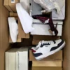The photo shows a package with footwear in the category BS.