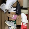 The photo shows a package with footwear in the category BS.
