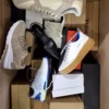 The photo shows a package with footwear in the category BS.