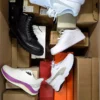 The photo shows a package with footwear in the category BS.