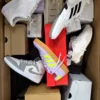 The photo shows a package with footwear in the category BS.