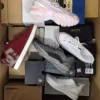 The photo shows a package with footwear in the category BS.