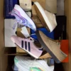 The photo shows a package with footwear in the category BS.