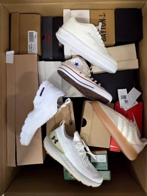 The photo shows a package with footwear in the category BS.