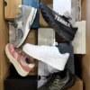 The photo shows a package with footwear in the category BS.