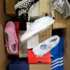 The photo shows a package with footwear in the category BS.