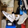 The photo shows a package with footwear in the category BS.