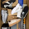The photo shows a package with footwear in the category BS.