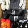 The photo shows a package with footwear in the category BSU.