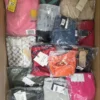 The photo shows a package with clothing in the category K.