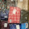 The photo shows a package with clothing in the category AR.
