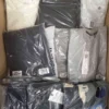 The photo shows a package with clothing in the category AM.