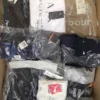 The photo shows a package with clothing in the category AM.