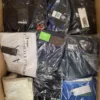 The photo shows a package with clothing in the category AM.