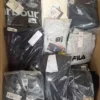 The photo shows a package with clothing in the category AM.
