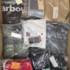 The photo shows a package with clothing in the category AM.