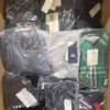The photo shows a package with clothing in the category AM.