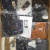 The photo shows a package with clothing in the category AM.