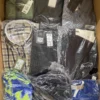 The photo shows a package with clothing in the category AM.