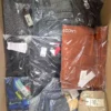The photo shows a package with clothing in the category AM.