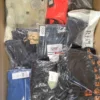 The photo shows a package with clothing in the category AM.